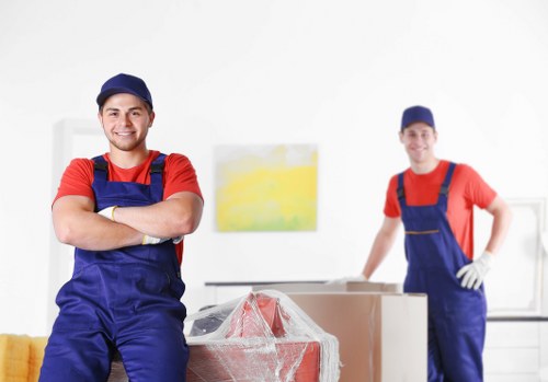 Local van removal service handling boxes near Putney homes