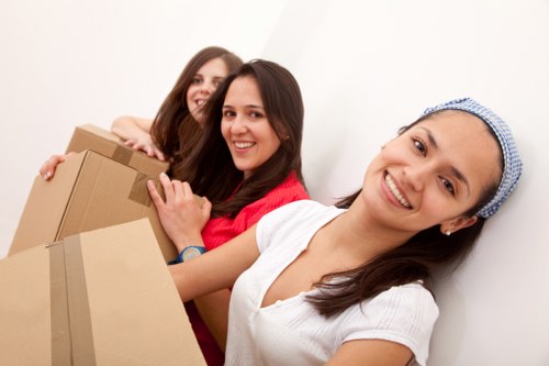 Packing and loading furniture into a moving van in Putney