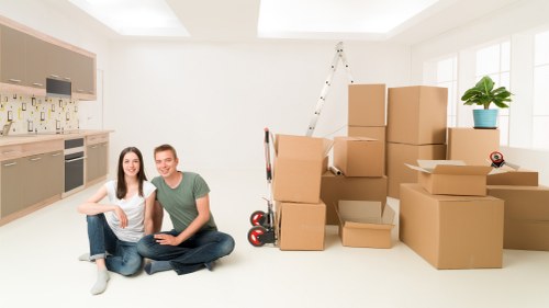 Unpacking household essentials in a Putney property