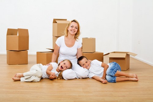Professional team handling furniture during a Putney home removal
