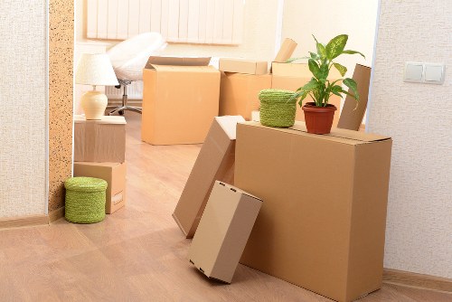 Loading furniture into a removals van in Putney
