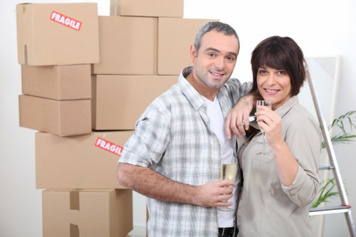 Packed boxes and furniture ready for removal service in Putney